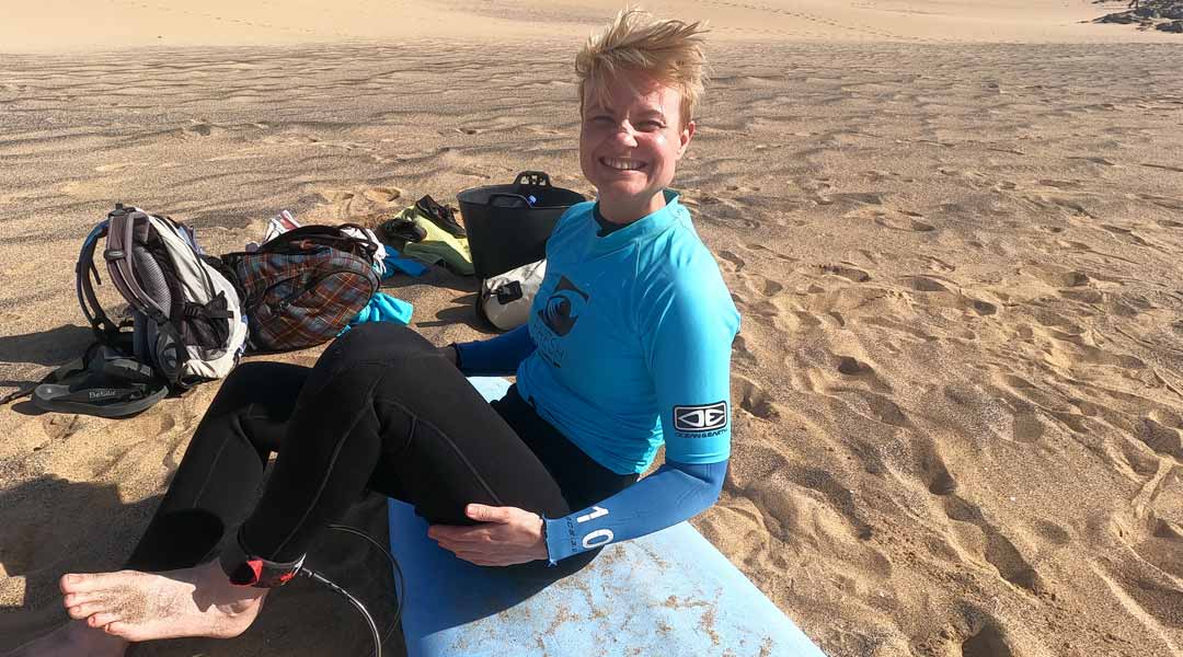 happy surfer at the beach