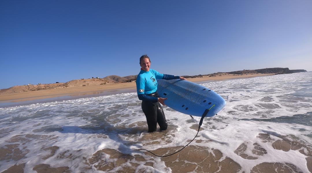 surfing makes happy surf lesson